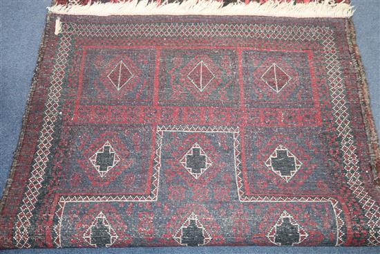 A Belouch rug 205 x 109cm